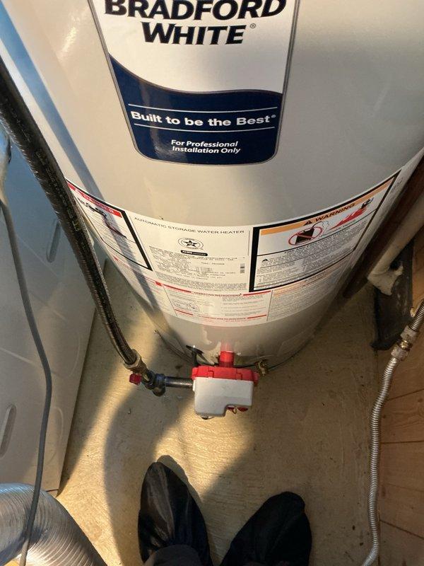 Responded to no hot water complaint on Bradford White propane water heater. Upon inspection, unit was attempting to ignite but failing to maintain flame. Investigated fuel supply and discovered propane tank was completely empty. As a safety precaution, shut off gas supply valves to both the water heater and dryer due to customer reporting unusual odor in home that could not be definitively identified as sewer gas or propane. Advised customer to refill propane tank and recommended follow-up service to perform leak detection testing on gas lines and connections to ensure system integrity before restoring service to appliances.