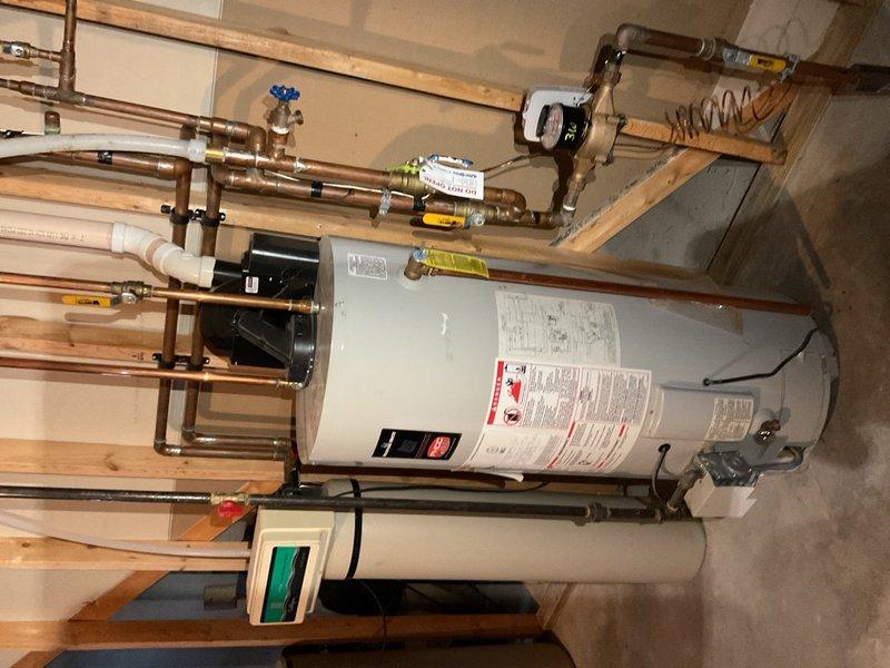 Performed AC maintenance on a 2018 Bryant furnace with a 2001 Bryant R-22 air conditioning system. Recorded operational parameters including return air dry bulb at 70.2°F, supply air at 56.5°F, outdoor dry bulb at 73°F, suction pressure at 64.7 psig, and liquid line pressure at 188 psig. After 15 minutes of runtime, indoor temperature split measured 13.7°F, indicating insufficient cooling performance and likely low refrigerant charge. Diagnostic readings suggest the R-22 system has experienced refrigerant loss, typically indicative of a leak or gradual charge depletion over time. No refrigerant service was performed as R-22 is no longer stocked due to phase-out regulations and limited availability. System remains operational but with reduced cooling capacity. Reviewed all diagnostic probe readings and performance data with homeowner, who elected to continue operating the unit as-is with plans to evaluate system replacement in spring unless complete failure occurs sooner.