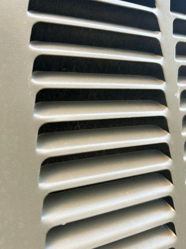 Responded to a no cooling complaint on a 4-year-old system. Upon arrival, inspected the indoor air handler and measured supply air temperature at 64.6°F, indicating inadequate cooling performance. Checked air filter condition and proceeded to outdoor unit inspection, where diagnostics revealed low refrigerant charge. Performed extended system runtime testing for 12 minutes baseline and an additional 13 minutes with charging jacket installed, with minimal change in operating parameters, confirming active refrigerant leak in the system.

Added proper weighed-in refrigerant charge to manufacturer specifications and injected UV dye into the system to facilitate future leak detection and pinpointing. Rechecked supply air temperature after refrigerant addition and verified proper system operation with supply air temperature dropping to 55.8°F, restoring adequate cooling capacity. System now operating within normal parameters. Advised that UV dye will require approximately one month to circul