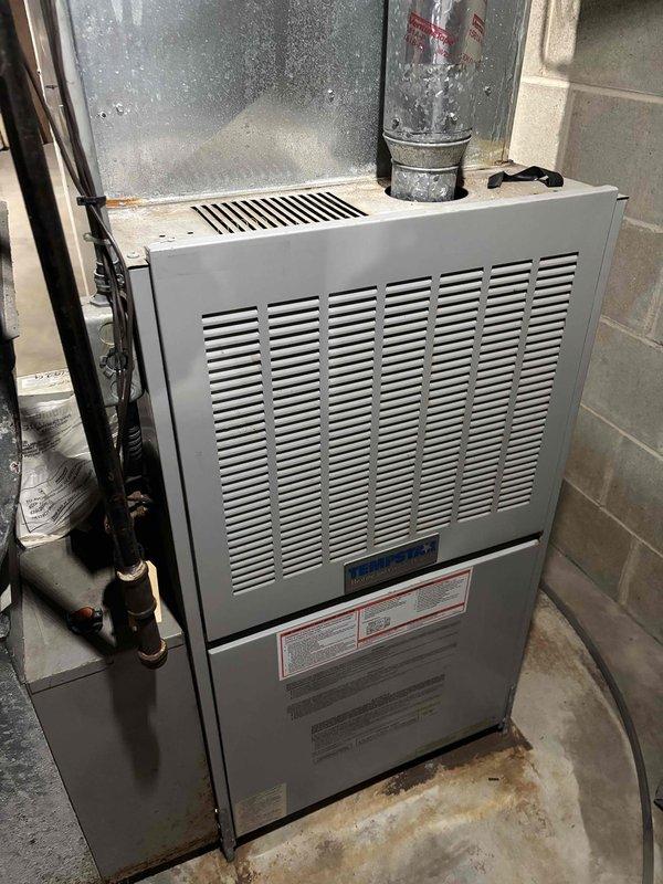 Completed comprehensive AC tune-up and maintenance on one Rudd air conditioning system utilizing R22 refrigerant with ambient outdoor temperature at 76 degrees. Thoroughly inspected indoor air handler including filter condition, condensate drain line, blower motor operation, electrical wiring connections, and all electrical components with all items found in acceptable working condition. Verified temperature split across evaporator coil within manufacturer specifications. Conducted complete inspection of outdoor condensing unit including condenser coil cleanliness, capacitor condition and ratings, and physical condition of cabinet and components. Measured and recorded amp draw on condenser fan motor, compressor, and contactor with all readings within normal operating parameters. Evaluated refrigerant charge using industry-standard testing methods and confirmed proper charge level. System operating normally with no deficiencies noted at time of service completion.