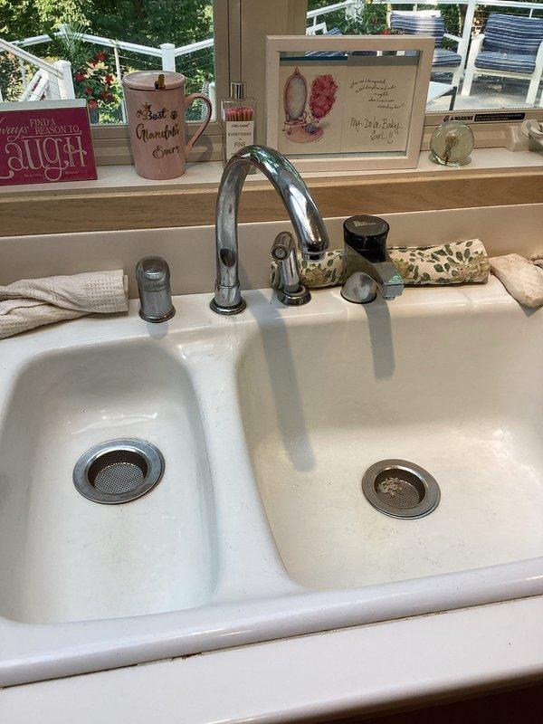 Responded to emergency plumbing service call for burst copper pipe in residential property. Conducted comprehensive assessment of plumbing system, identifying multiple areas requiring repair and replacement including laundry room fixtures, bathroom faucets, and main water shut-off valve. Successfully replaced laundry room faucet with new chrome fixture, restoring full functionality to the washing machine water supply. Addressed the burst copper pipe emergency to prevent further water damage. Documented existing conditions through photography, capturing ceiling-mounted plumbing components and newly installed fixtures. Prepared detailed estimates for remaining work including installation of additional bathroom faucets and replacement of main shut-off valve. Customer approved laundry faucet replacement, which was completed during this visit. Additional repairs scheduled for future appointment pending customer approval of estimates.