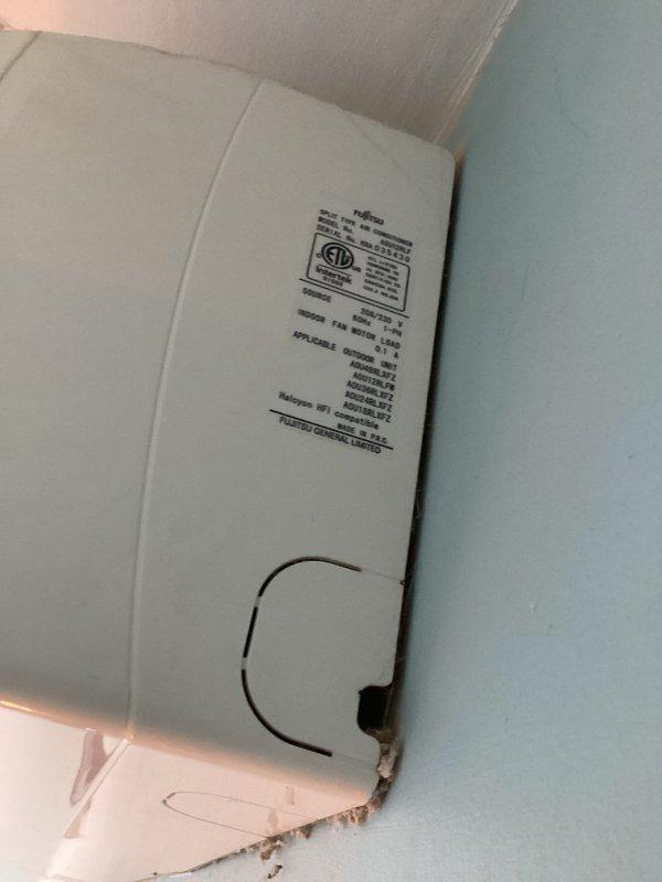 Responded to no cooling complaint on 10+ year old Fujitsu mini split system. Unit was not powering on and displayed 6 flashes at LED3 indicator. Consulted with technical support to diagnose the fault code and determined two thermistors in head unit C had failed, preventing system operation. Documented findings with photos of the indoor air handler unit and manufacturer label information. Parts department will provide estimate for replacement thermistors, and service call has been rescheduled to complete repairs once components are available.