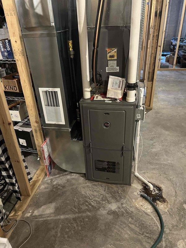 Responded to no cooling call on 9-year-old Ruud system where air conditioning would not activate from thermostat. Discovered damaged wiring in outdoor condensing unit and attempted troubleshooting by placing thermostat in test mode, which confirmed additional issues. Replaced faulty thermostat, repaired damaged wires in outdoor unit, and performed full system operational testing to verify proper cooling function restored.