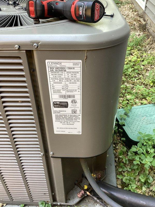 Responded to no cooling complaint on 9-year-old Lennox 14ACX system. Performed diagnostic evaluation and determined compressor failure as primary cause of no cooling condition. Identified possible refrigerant system restriction requiring further investigation. Verified unit is covered under existing parts warranty from original installing contractor. Documented system conditions with photographs showing outdoor condensing unit and component access points. Due to age of equipment and extent of required repairs, provided customer with options including warranty repair with associated labor and replacement system alternative at discounted pricing. Initiated warranty claim processing for failed compressor component.