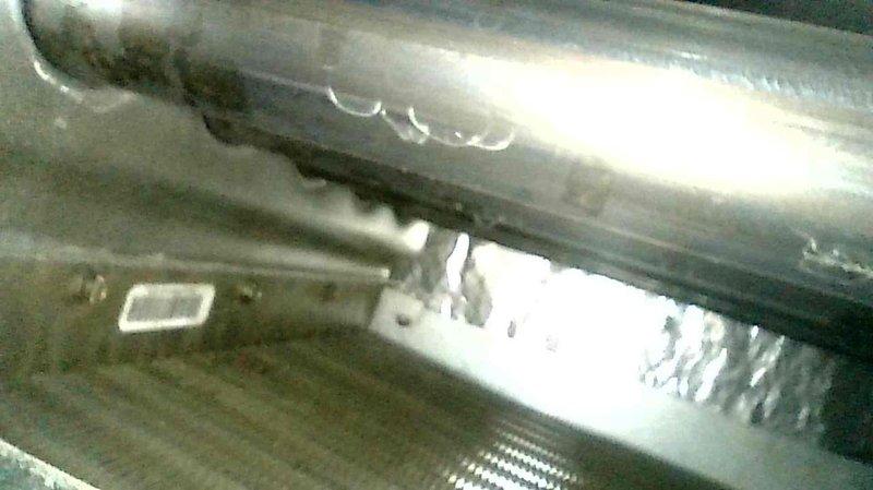 Responded to warranty call for recently installed furnace producing ticking noise during blower operation. Removed evaporator coil to inspect for loose components but found no issues. Upon further investigation using fish camera, identified heat exchanger rattling as source of noise. Inspected heat exchanger thoroughly for cracks or structural compromises but found none. Presented options for heat exchanger replacement or full furnace replacement, but homeowner elected to monitor the condition and continue operation as-is since no safety concerns were detected.