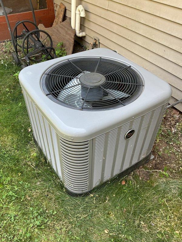 Responded to service call for 9-year-old residential air conditioning system not cooling home efficiently on hot days. Upon inspection, determined system was overcharged with R410A refrigerant, causing reduced cooling performance. Recovered one pound of excess refrigerant from system to restore proper charge levels and optimize cooling capacity.
