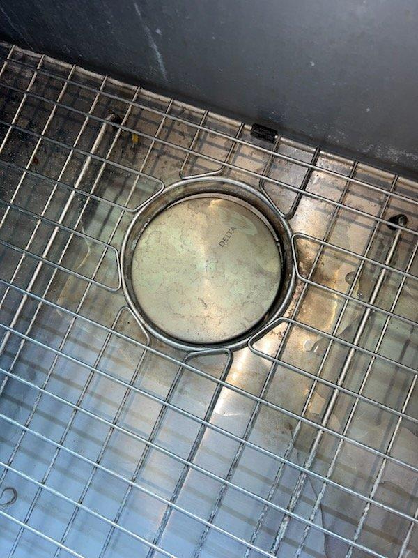 Responded to water leak under kitchen sink. Upon arrival, identified leak at horizontal drain pipe connection from P-trap assembly. Disconnected and inspected horizontal pipe from trap arm where separation had occurred. Reconnected drain assembly, ensuring proper alignment and secure connections at all joints. Verified all PVC connections were tight and leak-free. Tested system by running water through sink drain and confirmed no active leaks present. Kitchen sink plumbing restored to proper working condition.