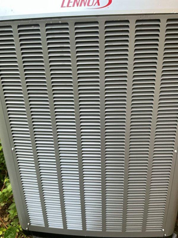 Responded to warranty call for Lennox heat pump unit that was off-level and had loose rattling manufacturer decal. Coordinated two-technician team to properly level and recenter the outdoor condenser unit using appropriate leveling techniques. Secured manufacturer branding decal to unit housing to prevent further detachment and rattling noise during operation.