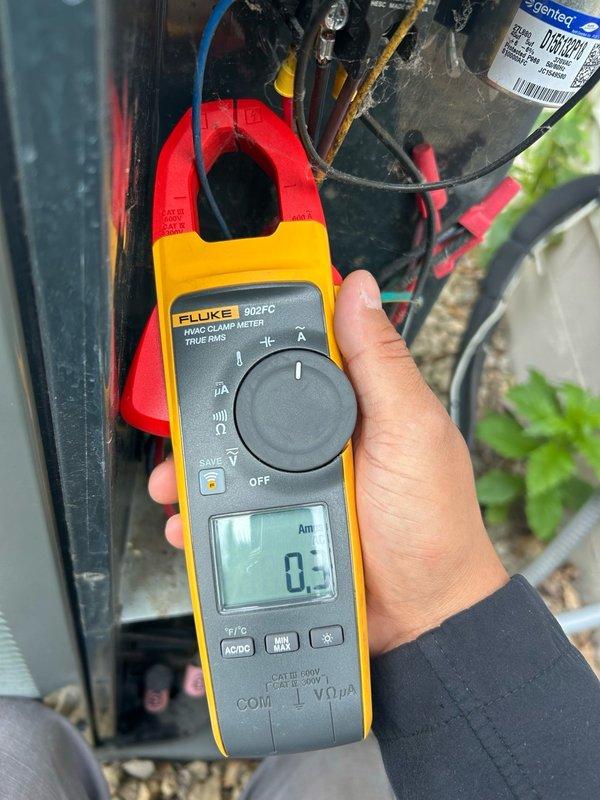 Responded to no cooling complaint on 2018 system that had been shut off during homeowner's absence. Performed comprehensive diagnostic including temperature differential measurement, capacitor and contactor testing, and refrigerant charge verification. Indoor supply temperature measured 16 degrees below return air, confirming adequate cooling performance. Outdoor coil cleaned during service visit. All electrical components including capacitor and contactor tested within manufacturer specifications, and refrigerant charge confirmed at proper levels. System operating normally at time of inspection with 66-degree ambient outdoor temperature. Recommended replacing electronic air filter every three months for optimal performance.