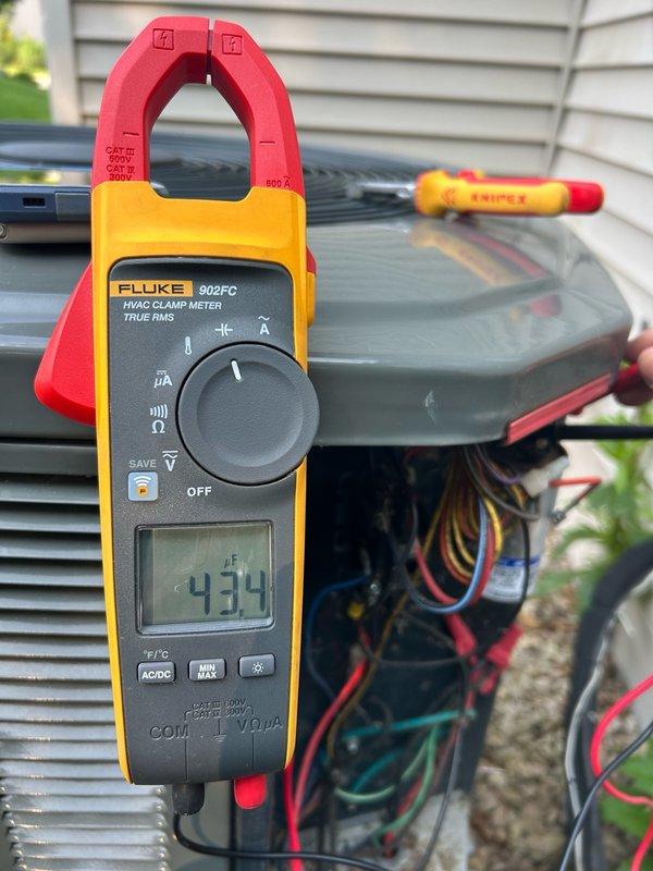 Responded to no cooling complaint on 2018 system that had been shut off during homeowner's absence. Performed comprehensive diagnostic including temperature differential measurement, capacitor and contactor testing, and refrigerant charge verification. Indoor supply temperature measured 16 degrees below return air, confirming adequate cooling performance. Outdoor coil cleaned during service visit. All electrical components including capacitor and contactor tested within manufacturer specifications, and refrigerant charge confirmed at proper levels. System operating normally at time of inspection with 66-degree ambient outdoor temperature. Recommended replacing electronic air filter every three months for optimal performance.