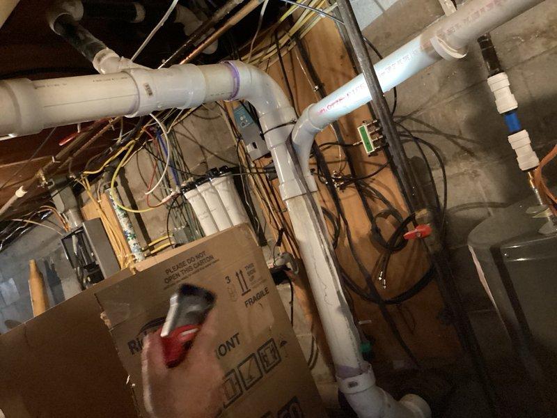 Responded to water damage incident caused by failed toilet supply line connector. Upon inspection, found the flexible braided connector line had completely separated, resulting in uncontrolled water discharge and subsequent property damage. Assessed the plumbing system and failure point to determine probable cause for insurance documentation purposes. The connector failure appeared consistent with material fatigue or manufacturing defect rather than installation error or external damage. Documented conditions with photographs showing the affected area, surrounding plumbing infrastructure, and mechanical systems. Provided professional assessment of the failure mechanism and submitted detailed repair estimate to address the damaged supply line and restore proper toilet water connection.
