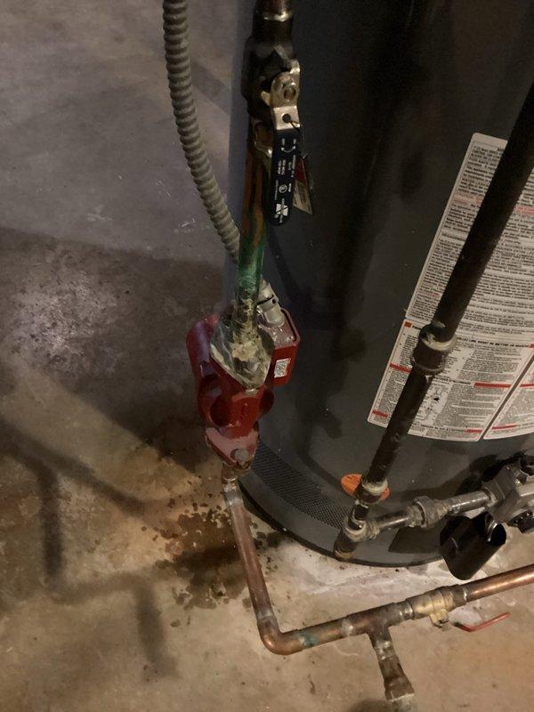 Responded to callback for continuously leaking backflow prevention system affecting entire building with water hammer, spitting, and hissing sounds. Diagnosed air infiltration into hot water system originating from failed recirculation pump. Inspected dual RPZ backflow assemblies showing significant age-related corrosion and deterioration, along with damaged recirculation pump assembly exhibiting active leakage at connection points. Provided estimate for recirculation pump repair to resolve building-wide water system issues.