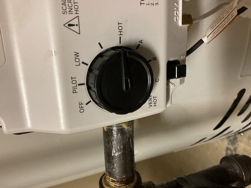 Responded to no hot water complaint and diagnosed 20-year-old gas water heater with failed gas valve stuck in closed position, preventing burner ignition. Removed and disposed of old unit, then installed new 50-gallon standard vent gas water heater with Hydrojet High Performance Energy Saver System, including new flexible gas line connection and proper venting. Tested unit operation, verified pilot light ignition, burner function, and temperature control settings to ensure proper hot water delivery.
