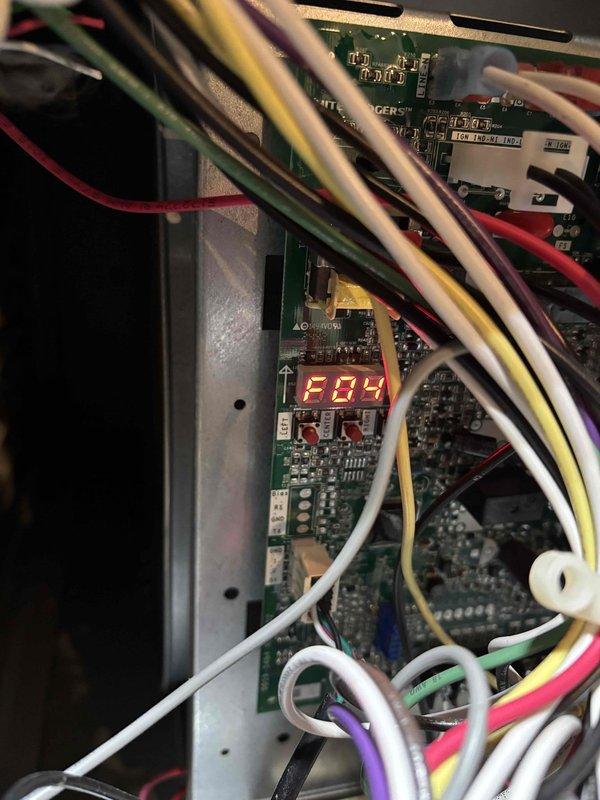 Responded to callback for air conditioning system experiencing extended run times and inadequate cooling performance. Performed comprehensive system diagnostics including thermostat verification, air filter inspection, temperature split measurements, outdoor unit examination, evaporator coil assessment, and refrigerant charge verification—all components found within normal operating parameters. Identified suboptimal blower motor speed setting on control board and adjusted fan speed configuration from F04 to F07 to increase airflow and improve cooling efficiency. Advised homeowner to monitor system performance over next several operating cycles and contact for follow-up if cooling issues persist.