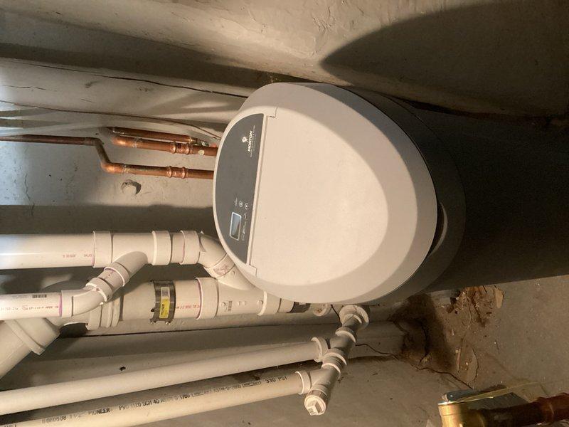 Responded to kitchen sink leak located under the cabinet. Upon inspection, discovered the P-trap O-rings were installed backwards, causing water seepage. Removed the existing trap assembly and replaced the complete under-sink drainage system with new PVC components. Installed proper P-trap configuration with correctly oriented O-rings to ensure watertight seal. Additionally, installed new dishwasher drain connection and tailpiece assembly to accommodate dishwasher hookup as requested. Secured all connections, tested system for leaks, and verified proper drainage flow. All work completed successfully with no active leaks detected.