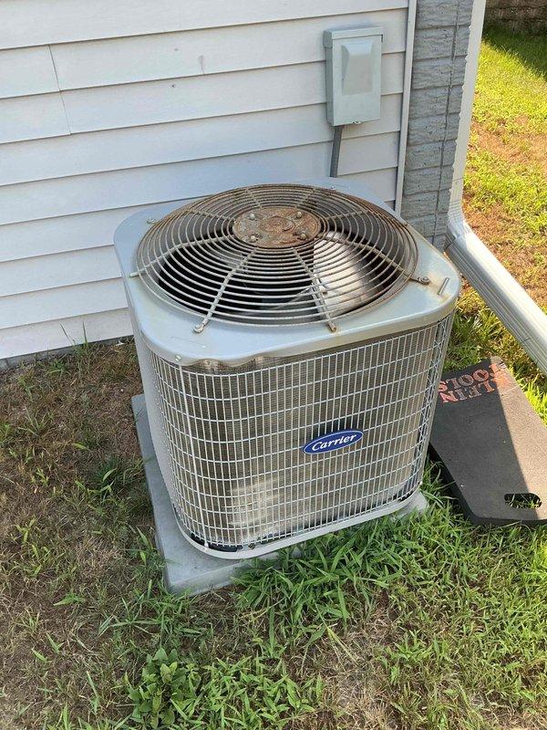 Completed comprehensive tune-up inspection on furnace and Carrier air conditioning system as part of membership maintenance agreement. Identified critical cracked heat exchanger on furnace requiring replacement and diagnosed low 410A refrigerant charge on outdoor condensing unit. Documented equipment make, model, and serial numbers with photos, provided repair estimates for heat exchanger replacement and refrigerant recharge, and coordinated comfort advisor consultation for gas line installation assessment.