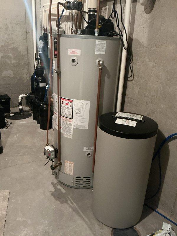 Completed annual cooling maintenance on 9-year-old air conditioning system. Replaced failing capacitor, outdoor temperature sensor batteries, and malfunctioning main level zone thermostat that was causing continuous fan operation when system was off. Verified all other components operating within specifications with proper refrigerant levels and system confirmed operational upon completion.