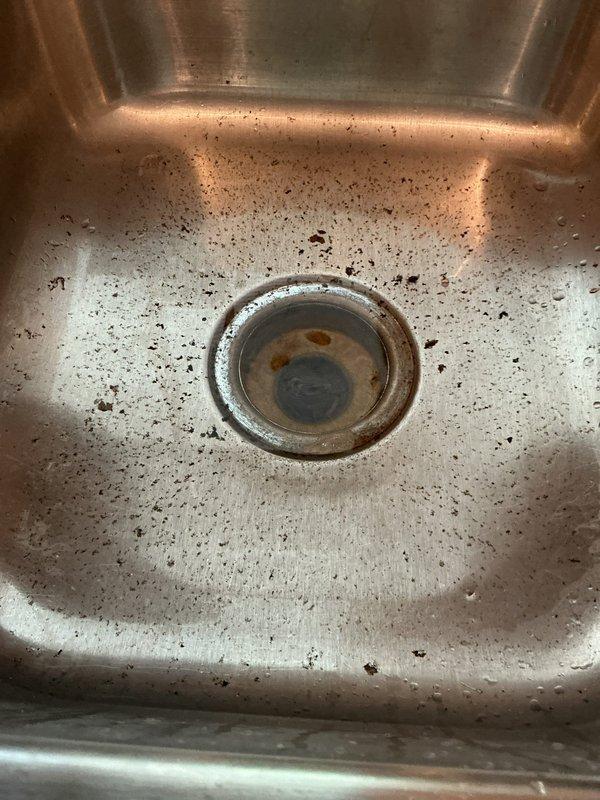 Responded to service call for kitchen sink backing up due to deep clog in drain line. Upon arrival, determined that previous cabling attempts by homeowner had been unsuccessful in clearing the obstruction. Diagnostic assessment indicated grease buildup as the primary cause of the blockage.

Cabled the entire kitchen drain line from the sink basin through to the mainline connection, successfully removing all debris and grease accumulation from the pipe. Utilized drain camera to verify complete clearance of the line and confirm proper flow throughout the entire drain system. Conducted thorough operational testing by filling and draining both basins of the double-sink multiple times to ensure proper drainage and flow rate. Inspected all connections and verified no leaks were present in the system. Kitchen sink restored to full working condition with clear drainage confirmed.