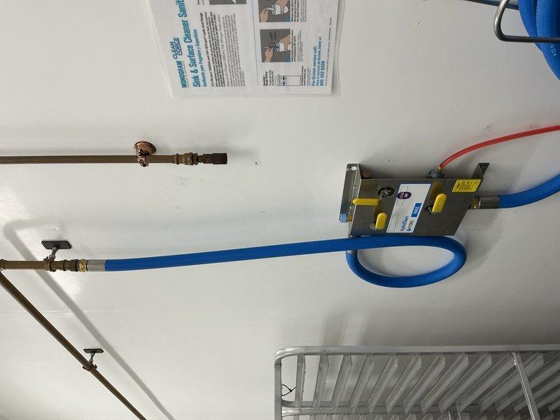 Removed fittings from two existing pipes and successfully capped four air lines in the mechanical utility area. The work involved disconnecting aged copper piping components and properly sealing the air line connections to prevent leaks and maintain system integrity.