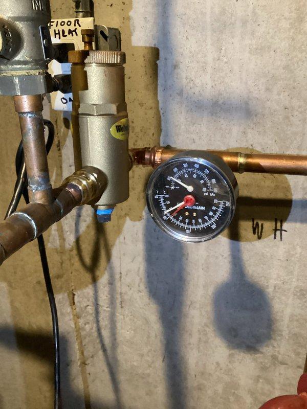 Performed comprehensive inspection of in-floor radiant heating system for real estate transaction. Evaluated manifold distribution system, pressure gauges, zone valves, and all associated piping and controls, confirming proper operation of all components. System found to be in good working order with no deficiencies noted at this time.