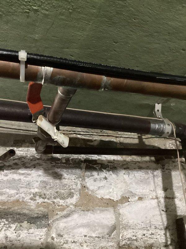 Responded to a leaking outside faucet caused by a failed galvanized water line that had fallen from the ceiling. Removed the deteriorated galvanized pipe and replaced it with new copper piping. Properly secured and strapped the new copper line to the ceiling joists to ensure stable support and prevent future sagging or failure.