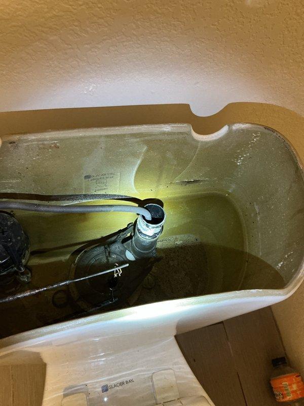 Responded to a municipal notice regarding excessive water consumption at approximately 3 gallons per hour. Conducted a comprehensive inspection of all interior water lines and plumbing fixtures throughout the residence to identify the source of continuous water loss.

**Diagnostic Findings:**

Performed systematic evaluation of all water supply lines with no visible leaks detected in accessible piping. Inspected all plumbing fixtures and identified two problem areas in the basement level. The basement shower valve exhibited a slow drip, determined to be insufficient to account for the reported water usage rate. The basement toilet was found to be the primary source of water loss, with the flapper valve failing to maintain a proper seal, causing the fill valve to cycle and refill the tank approximately every 10 minutes.

**Work Performed:**

Removed and replaced the defective shower valve assembly in the basement shower. Tested the new valve installation for proper operation and verifie
