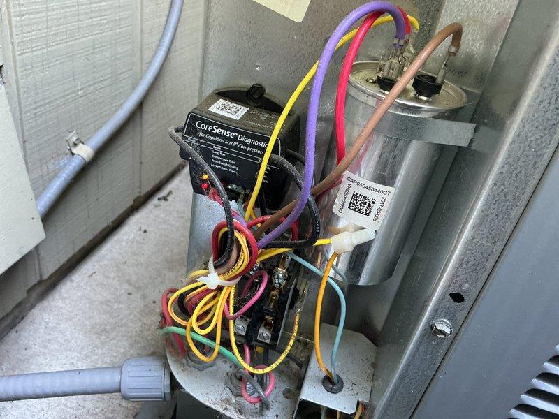 Responded to no-cool complaint on 9-10 year old residential central air conditioning system. Upon inspection, diagnosed failed capacitor preventing compressor operation. Replaced defective capacitor with new unit and performed complete system testing. Verified all electrical components, compressor operation, and refrigerant charge levels are within manufacturer specifications. System restored to full cooling operation.
