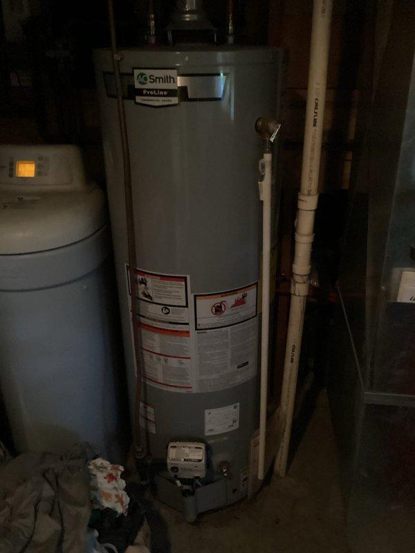 Completed AC maintenance visit on a 20 year-old system. Unit is currently cooling but found refrigerant levels low and capacitor reading out of acceptable range. Documented equipment make, model, and serial numbers with photographs per service agreement requirements. Advised customer that the out-of-range capacitor can lead to compressor failure and reduced system efficiency. Customer acknowledges system age and condition, opting to defer replacement until complete system failure occurs.