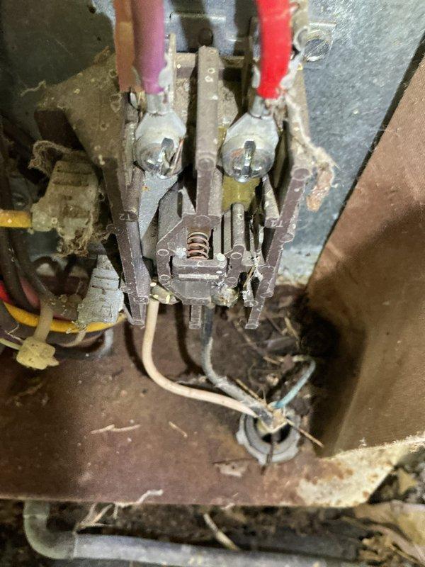 Completed comprehensive maintenance inspection on 30-year-old residential HVAC system utilizing R22 refrigerant. Replaced failed dual capacitor and contactor due to significant corrosion and electrical deterioration observed at connection points. Performed standard air conditioning and furnace tune-up procedures including filter inspection, electrical connection evaluation, and system operational testing. Customer advised that unit is original equipment and plans to operate system until complete failure. Documentation provided to comfort advisor for future replacement consultation given advanced age of equipment and obsolete refrigerant type.