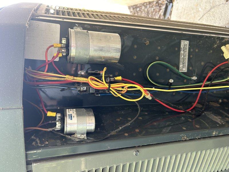 Responded to no cooling complaint on approximately 10-11 year old air conditioning unit. Upon inspection, discovered rodent damage to electrical wiring and failed capacitors. Replaced damaged wiring and capacitors, then performed system diagnostics. Testing revealed high pressure cut-out switch failed open, showing no continuity with unit off and equalized pressures at 200 PSI on both high and low sides. Provided estimate for high pressure switch replacement to restore unit operation.