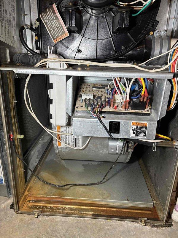 Responded to no cooling complaint on 15-year-old residential air conditioning system utilizing 410A refrigerant. Performed comprehensive maintenance inspection of both indoor air handler and outdoor condensing unit with ambient temperature at 77 degrees. Inspected and verified proper operation of air filter, condensate drain, blower motor, electrical wiring, and all electrical components. Verified acceptable temperature split across evaporator coil. Examined outdoor unit including condenser coil and capacitor condition. Measured and recorded amp draw on blower motor, compressor, and contactor—all within manufacturer specifications. Testing revealed system is low on refrigerant charge. Provided estimate for refrigerant recharge with leak detection dye to identify source of refrigerant loss. Due to advanced age of equipment at 15 years old, also recommended system replacement as a more cost-effective long-term solution. System currently operating normally following inspection.