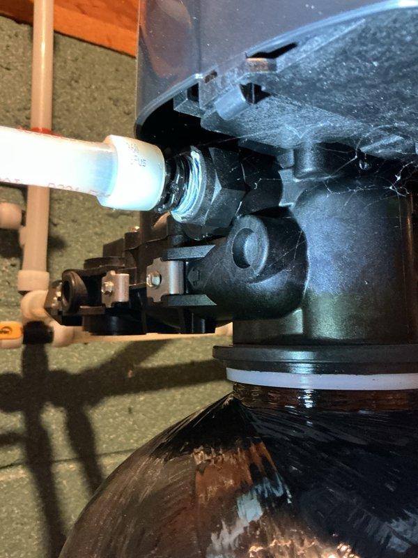 Responded to leak on previously installed water treatment system. Upon inspection, identified cracked drain adapters as source of leak. Shut down system to prevent further water damage and completed part order form for replacement drain adapters. System remains offline pending arrival and installation of replacement components under warranty coverage.