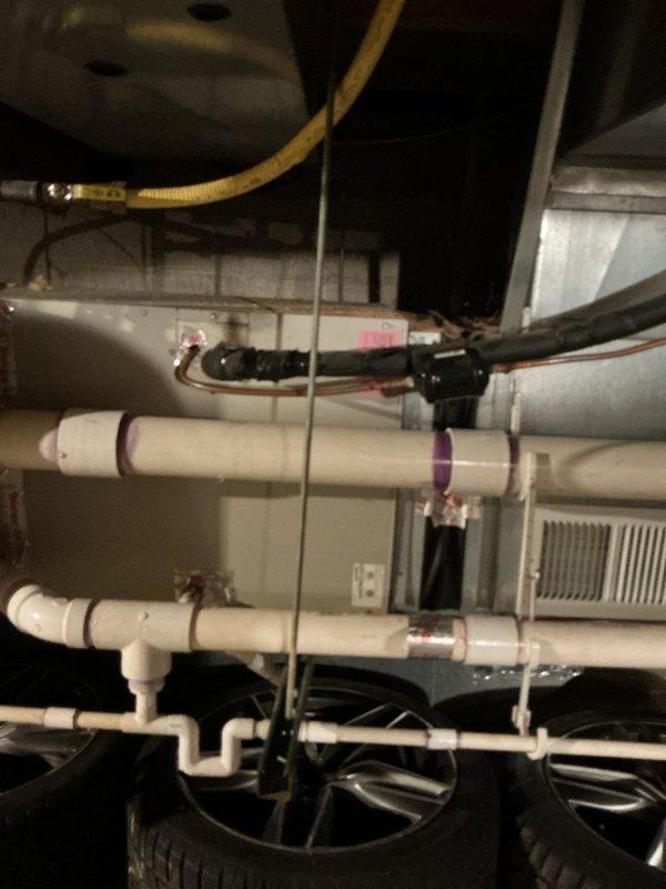 Completed annual cooling maintenance visit and AC tune-up on residential system. Identified weakening capacitor on compressor side during inspection and recommended replacement or installation of hard start kit to ensure reliable operation. Inspected attic-mounted HVAC components including ductwork, drainage lines, and air filtration system; all other components found operating within normal parameters.