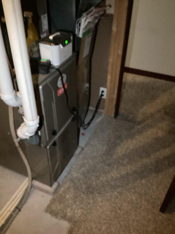Completed annual AC and furnace maintenance inspection on a 13-year-old system, evaluating safety, efficiency, and reliability of both units. During furnace testing, discovered inducer motor was stuck and would not allow system to start; manually freed the motor and system operated normally afterward, though this component may require monitoring or replacement in the future to prevent failure. Performed exterior condenser unit cleaning, inspected all AC components which were found to be in good working condition, and noted refrigerant charge was slightly low but system is currently maintaining adequate cooling performance.