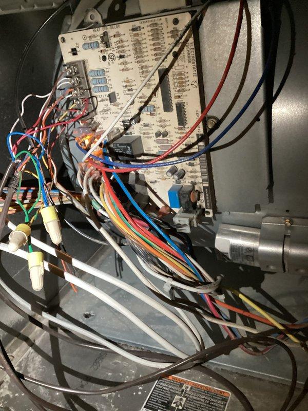 Completed annual AC and furnace maintenance inspection on a 13-year-old system, evaluating safety, efficiency, and reliability of both units. During furnace testing, discovered inducer motor was stuck and would not allow system to start; manually freed the motor and system operated normally afterward, though this component may require monitoring or replacement in the future to prevent failure. Performed exterior condenser unit cleaning, inspected all AC components which were found to be in good working condition, and noted refrigerant charge was slightly low but system is currently maintaining adequate cooling performance.