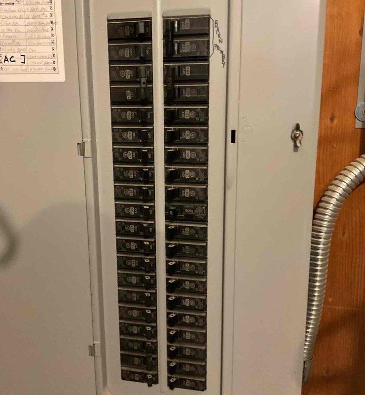 Completed final inspection and code corrections for newly installed 4-ton, 14.5 SEER2 single-stage air conditioning system with matching cased coil and factory-installed TXV valve. Installed new electrical whip to outdoor condensing unit with proper conduit routing and wall-mounted disconnect, verified all electrical connections at panel and equipment, and installed code-compliant strapping at furnace for refrigerant line support. All components inspected, tested, and confirmed operational per manufacturer specifications and local electrical codes.