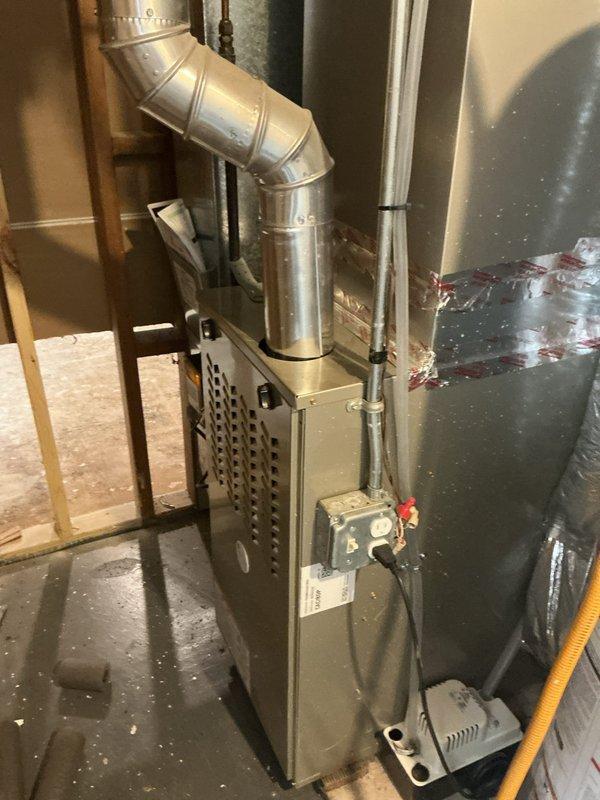 Responded to no cooling call on residential air conditioning system. Upon arrival, found unit completely inoperative with no air movement from indoor blower. Inspection revealed electrical disconnect at outdoor condensing unit was not fully seated, interrupting power to system. Additionally, discovered heavily restricted air filter at furnace, significantly impeding airflow. Fully engaged disconnect switch to restore power and replaced dirty filter. Verified system startup with proper operation of both indoor and outdoor units. System now cooling normally with adequate airflow throughout.