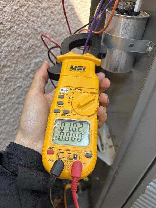 Performed comprehensive maintenance on 2-year-old residential air conditioning system utilizing 410A refrigerant under 83-degree ambient conditions. Conducted thorough inspection of indoor air handler including filter condition, condensate drain line, blower motor operation, and all electrical wiring and components. Verified proper temperature split across evaporator coil. Inspected outdoor condensing unit including condenser coil cleanliness, capacitor condition and ratings, and electrical connections. Measured and recorded amperage draw on condenser fan motor, compressor, and contactor to verify equipment operating within manufacturer specifications. Verified proper refrigerant charge and system pressures. All components found operating within normal parameters. System confirmed operational and cooling effectively at time of service completion.