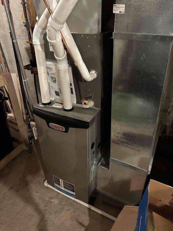 Responded to service call for Lennox system displaying error code 700 with reported thermostat temperature sensor error. Upon arrival, performed comprehensive system inspection including verification of all wiring at thermostat, indoor unit, and outdoor condenser—all connections found secure and properly terminated. Conducted full AC tune-up due to lack of previous maintenance history. Condenser coil was heavily obstructed with debris and required thorough cleaning to restore proper airflow. Verified all electrical components including contactors, capacitors, and compressor amperage—all readings within manufacturer specifications. Replaced dirty air filter and cleared condensate drain line. System achieved 20-degree temperature differential across evaporator coil, confirming proper refrigerant charge and heat exchange. Cycled thermostat through multiple operations with no error codes reproduced or temperature sensor faults detected. System restored to full operational status with prope