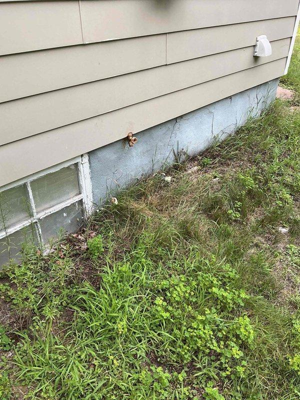 Responded to emergency service call for foreclosed property requiring water service restoration. Property had not been properly winterized, resulting in multiple leak points throughout the basement plumbing system. Conducted diagnostic assessment of exposed basement piping to identify all compromised sections and connections.

Performed minor repipe of damaged water supply lines using copper pipe and appropriate fittings. Replaced failed sections of piping that had frozen and burst during winter months. Installed new pipe connections and secured all lines to floor joists per code requirements. Integrated white PVC drainage components with existing copper supply lines where necessary.

Verified all new joints were properly soldered and pressure-tested system to ensure leak-free operation. Confirmed water service could be safely restored to property. All repairs completed to bring plumbing system back to functional condition for occupancy.