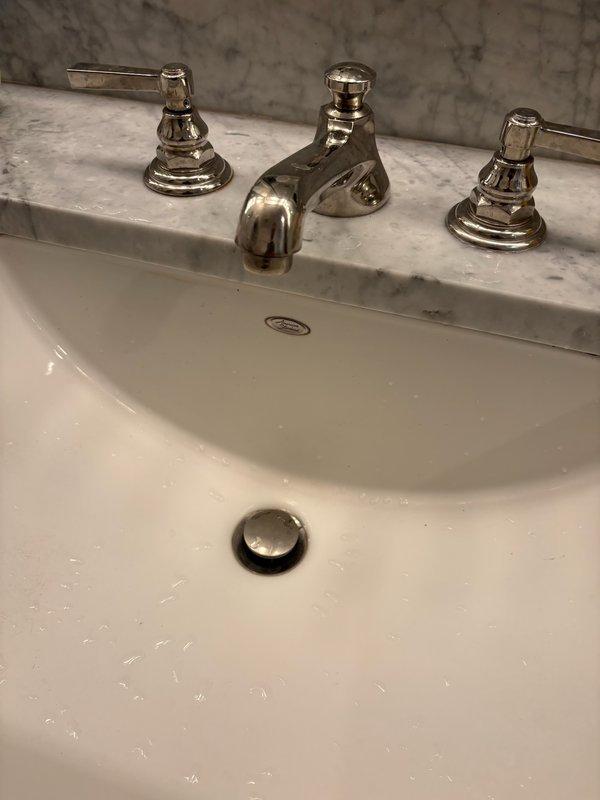 Responded to low water pressure complaint affecting bathroom sink and shower. Upon inspection, identified significant corrosion buildup in sink aerator causing restricted flow. Replaced corroded aerator to restore proper water pressure at sink faucet. Assessed shower fixtures and identified similar corrosion-related pressure issues. Provided homeowner with recommendations for resolving the shower low-pressure condition and preventive maintenance options to minimize future mineral buildup in plumbing fixtures.