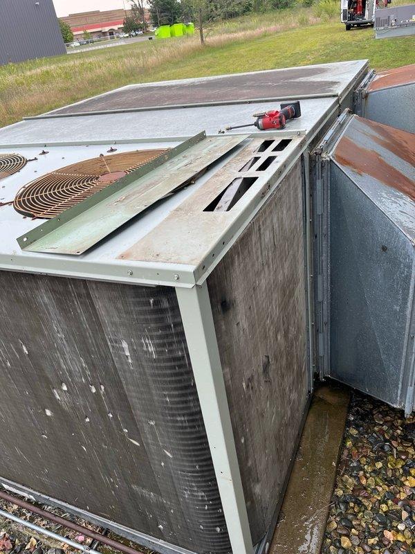 Performed comprehensive cleaning service on seven rooftop and split system units at commercial facility. Washed condenser coils on five RTUs without chemical application to restore proper heat transfer and system capacity, completing work without requiring unit disassembly. Additionally cleaned two residential-style split systems serving office spaces. Inspected dual compressor configurations, refrigerant lines, and electrical connections during service. Verified proper operation of all units following cleaning procedures. All equipment tested and confirmed operational upon completion.