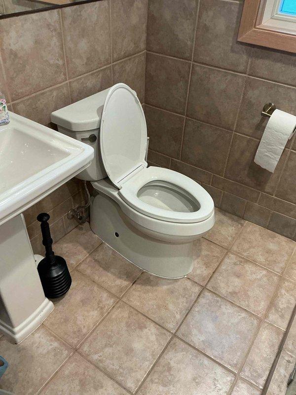 Responded to a toilet backup affecting only the fixture, with no impact to other drains in the residence. Upon arrival, removed the toilet to access the drain line and identified a toilet paper blockage located near the fixture connection. Utilized drain cable equipment to clear the obstruction, making multiple passes to ensure complete removal of the blockage. Verified proper drainage and line clearance using camera inspection equipment. Reinstalled the toilet with new wax ring seal, secured mounting bolts, and tested for proper flushing operation and water flow. Confirmed no leaks present at base or supply connections and verified system functioning normally upon completion.