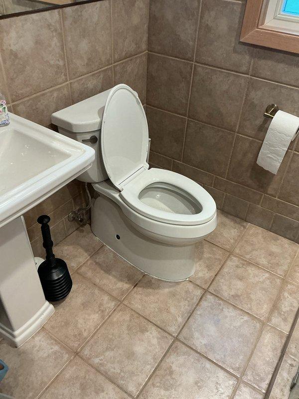 Responded to a toilet backup affecting only the fixture, with no impact to other drains in the residence. Upon arrival, removed the toilet to access the drain line and identified a toilet paper blockage located near the fixture connection. Utilized drain cable equipment to clear the obstruction, making multiple passes to ensure complete removal of the blockage. Verified proper drainage and line clearance using camera inspection equipment. Reinstalled the toilet with new wax ring seal, secured mounting bolts, and tested for proper flushing operation and water flow. Confirmed no leaks present at base or supply connections and verified system functioning normally upon completion.