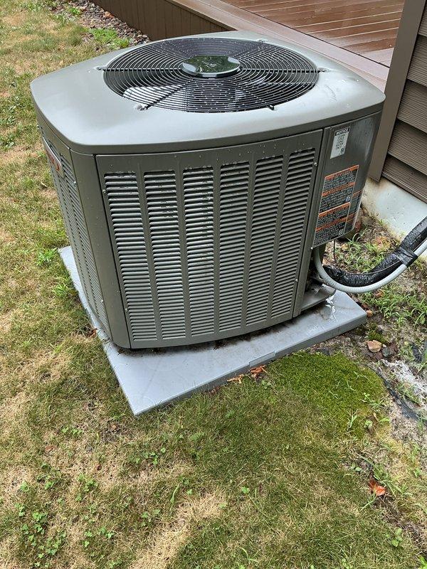 Completed routine maintenance on a 1-year-old residential air conditioning system and furnace as part of scheduled tune-up service. Performed comprehensive AC system inspection, replaced air filters with new Glasfloss pleated filters, and verified outdoor condensing unit operation. All equipment found functioning properly with no issues identified during service.