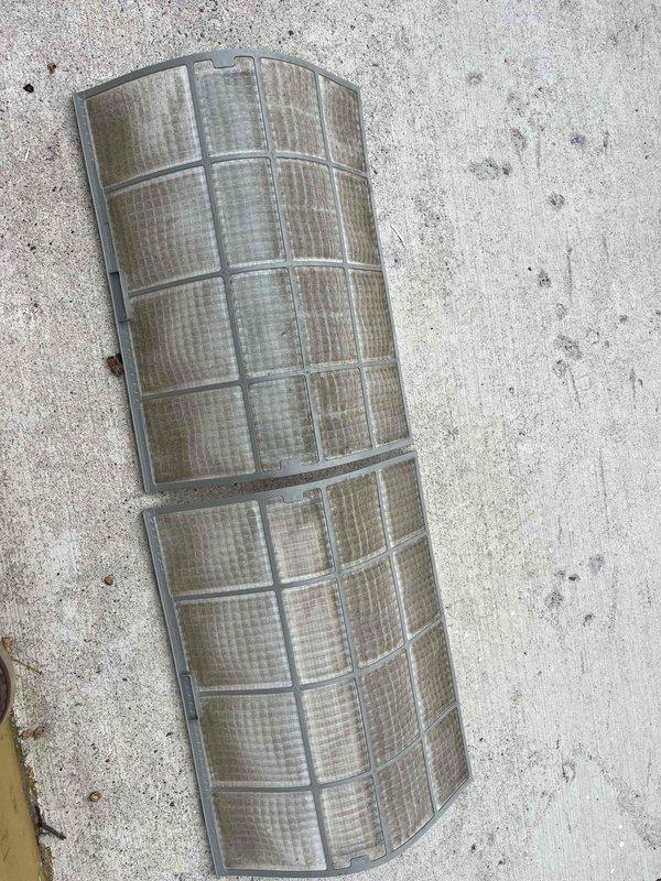 Performed comprehensive tune-up on mini-split system, including thorough washing of outdoor condenser unit and verification of all electrical connections and components. Removed and cleaned heavily soiled indoor air filters, which showed significant dust and dirt accumulation. Documented equipment make, model, and serial number information with photographs, completed operational testing of system, and confirmed unit is functioning properly.