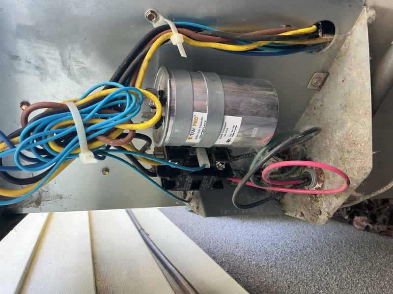 Completed annual heating and cooling maintenance on 12-year-old Payne HVAC system utilizing R-410A refrigerant. On furnace, scrubbed burners and flame sensor, inspected heat exchanger with no defects found, verified capacitor, blower motor, control board, and all wiring connections in proper working condition. Confirmed CO levels within safe parameters and measured supply air temperature delta at 53 degrees, indicating optimal heating performance. Replaced air filter and confirmed unit ready for winter operation. On air conditioning system, inspected outdoor unit capacitor, contactor, and refrigerant charge—all within manufacturer specifications. Rinsed condenser coils to remove debris, verified 19-degree temperature split across evaporator coil, and confirmed condensation drain line flowing freely. Both systems operating efficiently with no issues identified.