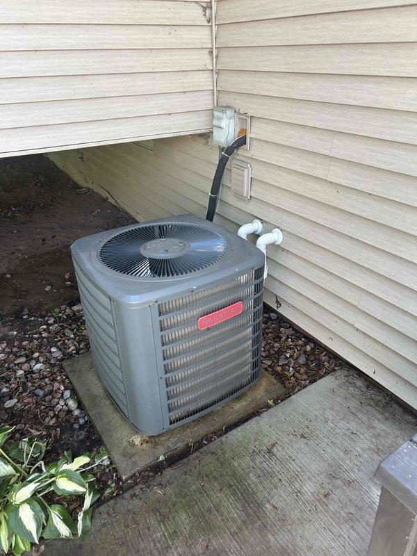 Performed comprehensive cooling maintenance on 9-year-old Goodman HVAC system as part of Family Rewards preventative maintenance agreement. Cleaned routine components, replaced air filter, and conducted complete operational testing of both outdoor condensing unit and indoor air handler. System evaluated and confirmed to be cooling properly with no issues identified.