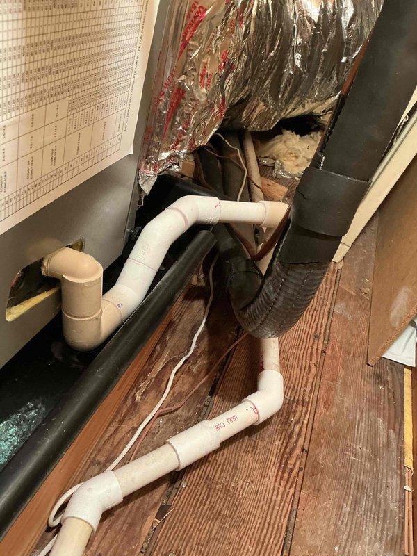 Responded to a callback on a Lennox system installed two days prior with no cooling and freezing conditions. Diagnosed low airflow and excessive high-side pressure due to refrigerant overcharge. Recovered refrigerant from system, performed evacuation to remove moisture and non-condensables, then recharged unit to manufacturer specifications. System restored to proper operation with correct pressures and airflow.