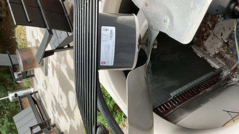 Responded to a non-operational outdoor condensing unit and diagnosed a failed condenser fan motor. Replaced the defective PSC motor (825/1075 RPM) with a new standard unit, restoring proper airflow and system operation. Verified unit functionality upon completion with all components running within normal parameters.